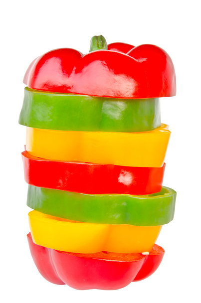 A selection of colorful bell peppers sliced in pieces to make on - Zdjęcie, obraz
