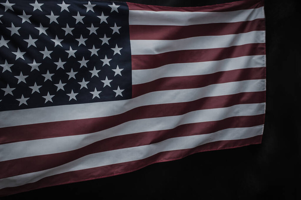 Closeup of waved USA flag over dark background - Zdjęcie, obraz