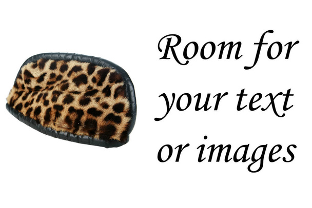 A Genuine REAL Leopard Fur Hat from Africa. isolated on white. room for your text. Leopard and Animal Fur. Fashion Statement for thousands of years. since the dawn of man. Real Leopard Fur Hat. Beauty and Fashion. African Hat. Beautiful Animal Fur.  - Foto, Imagem