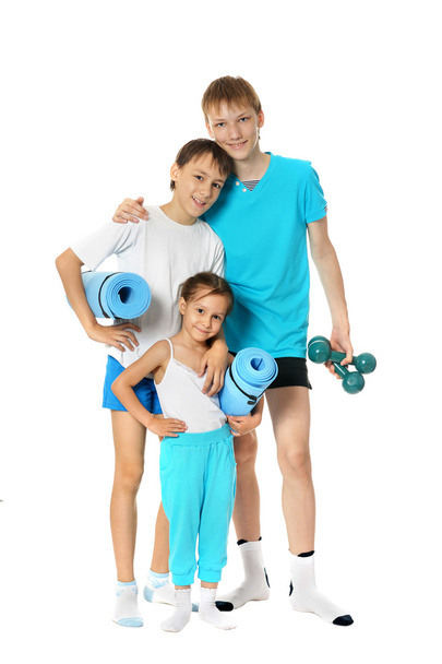 Two sport boys and little girl - Фото, изображение