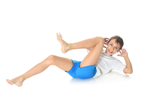Boy exercising yoga - Photo, Image