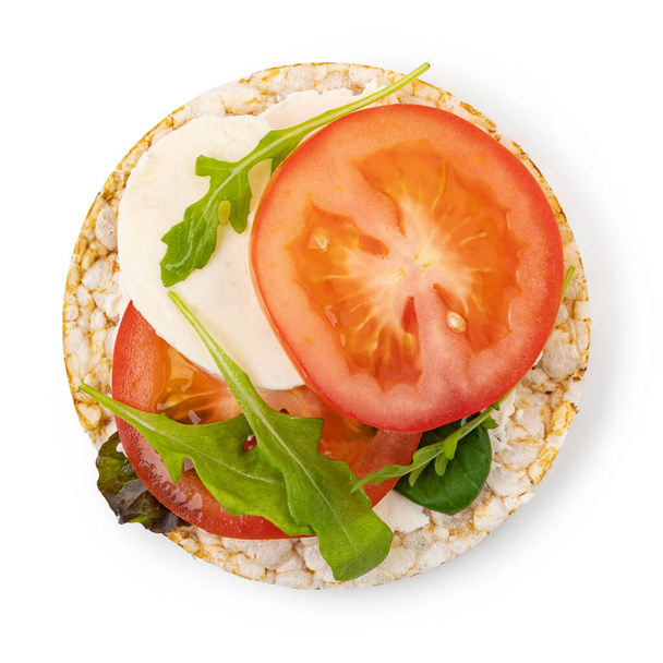 Rice cakes with cream cheese, tomato and mozzarella. isolated on white background - Φωτογραφία, εικόνα