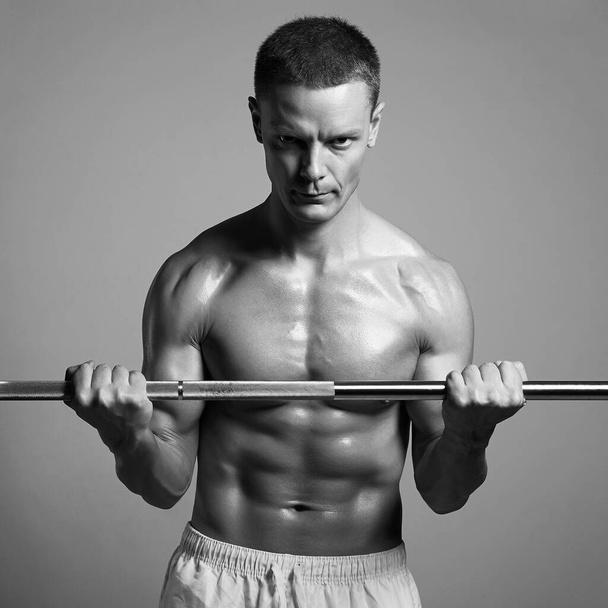 barbell bodybuilder. Naked body muscular Man. Gym. body-builder Boy.  - Photo, image