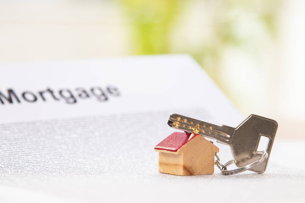 house with key and documents of purchase of house or mortgage - Photo, image