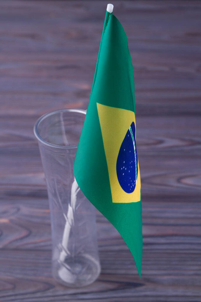 Vertical shot close-up green brazilian flag in the glass vase. - 写真・画像