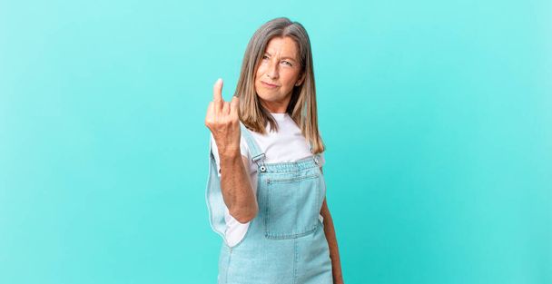 pretty middle age woman feeling angry, annoyed, rebellious and aggressive - Foto, Bild