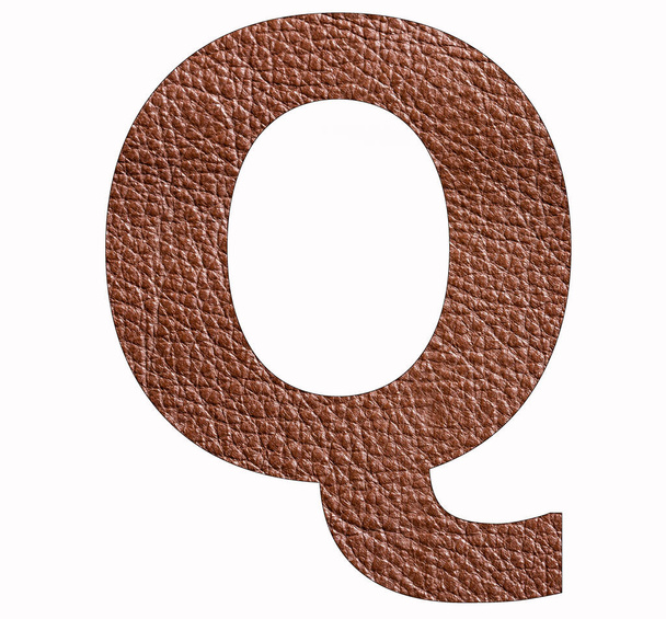 Q uppercase alphabet letter - Brown leather texture background - Foto, imagen