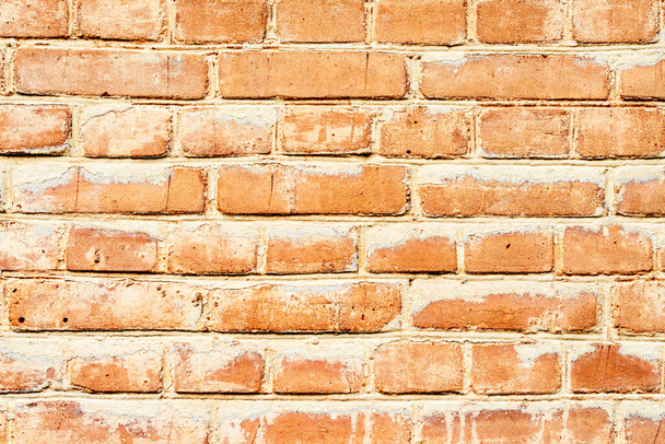 Υφή, τούβλο, τοίχος, μπορεί να χρησιμοποιηθεί ως φόντο. Τούβλο υφή με γρατσουνιές και ρωγμές - Φωτογραφία, εικόνα