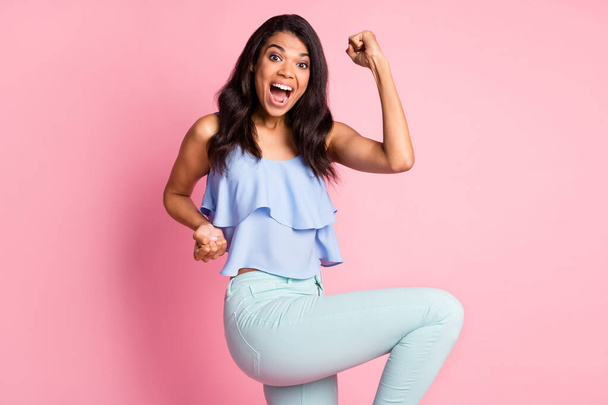 Profile photo of hooray brunette lady yell hands fists wear blue top isolated on pink color background - Foto, immagini