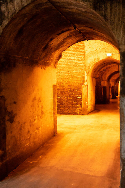 Champagne sparkling wine production in dark underground cellars, Reims, Champagne, France - Fotoğraf, Görsel