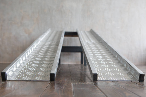 metal ramp compact step entrance for handicapped people in wheelchairs and lifting load - 写真・画像