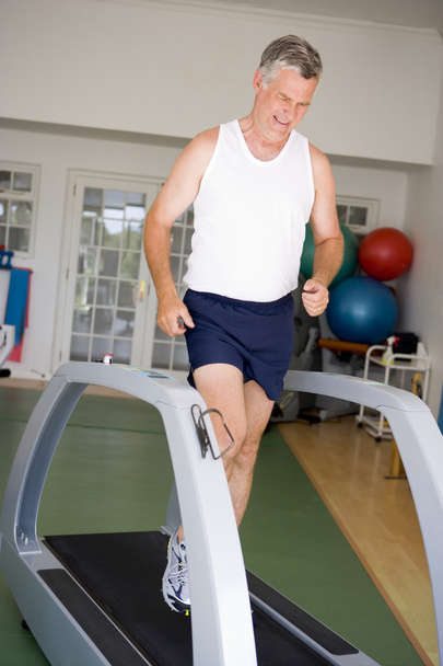 Man Running On Treadmill At Gym - Foto, Bild