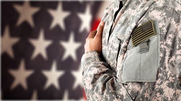 american soldier with flag on background, closeup - Zdjęcie, obraz