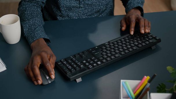 Black african american person typing on PC keyboard - Photo, Image