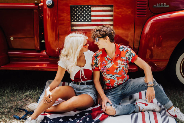 Couple in a vintage red truck - Photo, Image