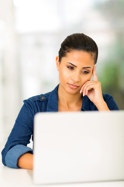 Focused woman using laptop - Photo, image