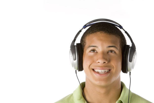 Teenage Boy Listening To Music On Headphones - Foto, imagen