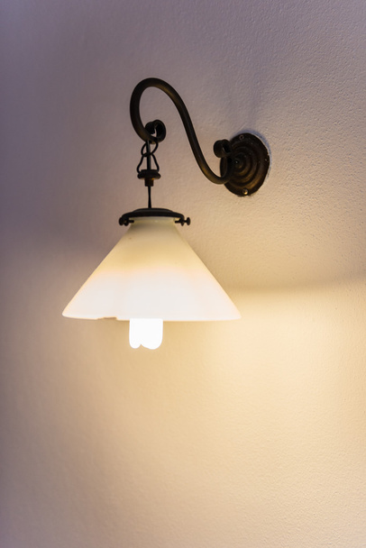 Lighted lamp on the wall - Photo, Image