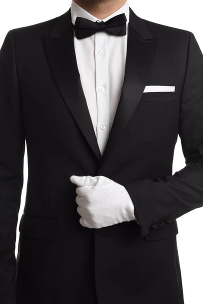 Butler in elegant uniform on white background, closeup - Fotografie, Obrázek