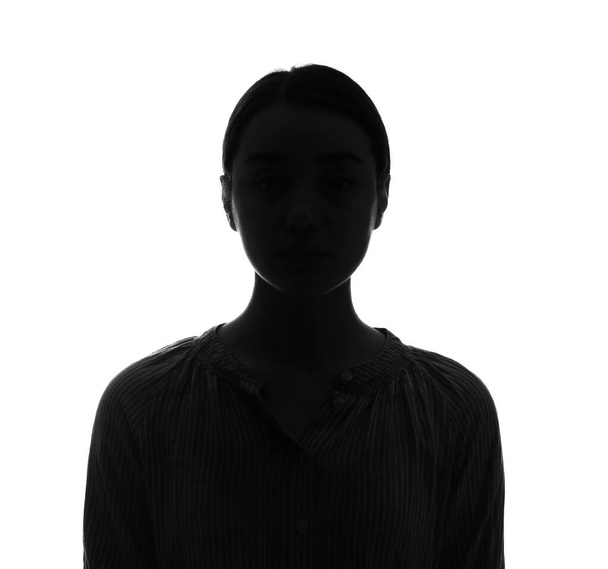 Silhouette of anonymous woman on white background - Zdjęcie, obraz