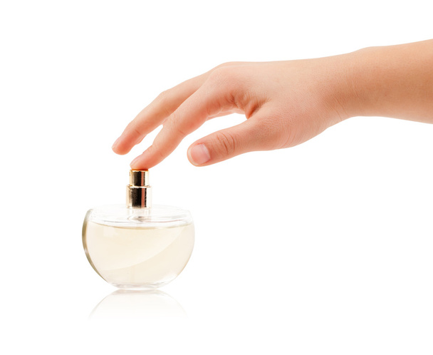 Kadın elleri parfüm sıkıyor. - Fotoğraf, Görsel