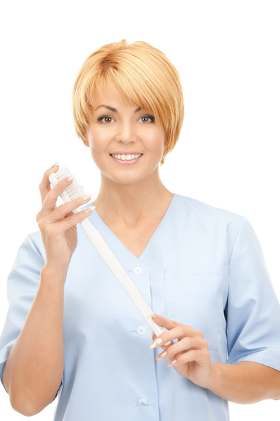 Picture of attractive female doctor with toothbrush - 写真・画像