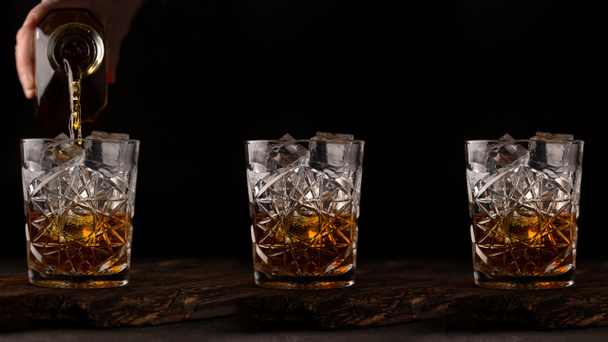 Whisky ou cognac est versé dans un verre à l'ancienne - Photo, image