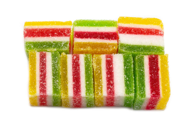 Chew multi-colored sweets on a white background. - Photo, Image