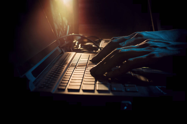 hacker hand finger touch on notebook laptop computer device for online hacking network technology internet, crime and robbery - Fotoğraf, Görsel