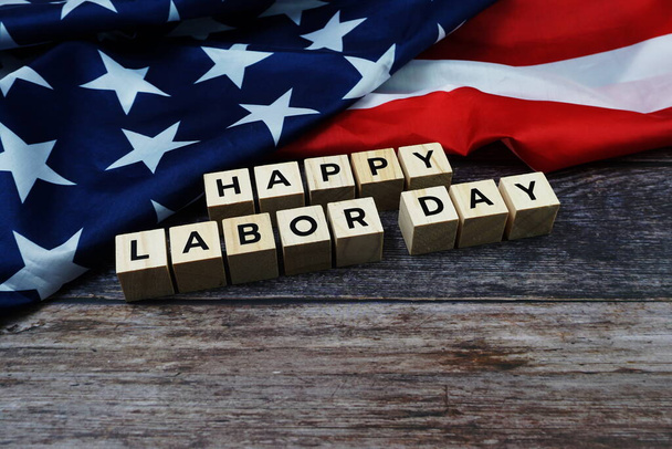 Happy Labor Day Word alphabet letters with USA flag on wooden background - Photo, Image