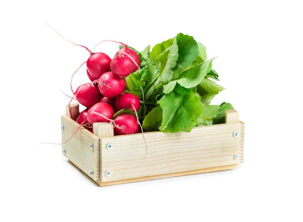 Bunch of radishes in a wooden box   - Photo, Image