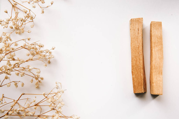 The sacred wood Palo Santo. Flat lay, top view. Copy space for text. - 写真・画像