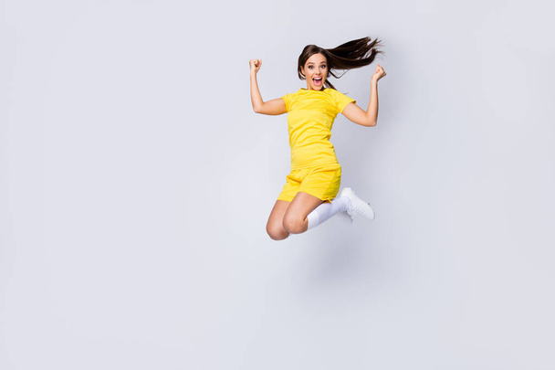 Full length body size view of nice beautiful satisfied crazy energetic glad cheerful cheery lucky straight-haired girl jumping having fun isolated over light white gray pastel color background - Φωτογραφία, εικόνα