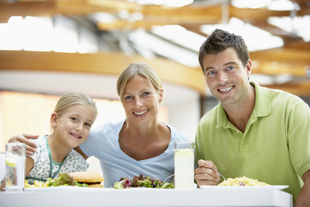 Family Having Lunch Together At The Mall - Foto, Imagen
