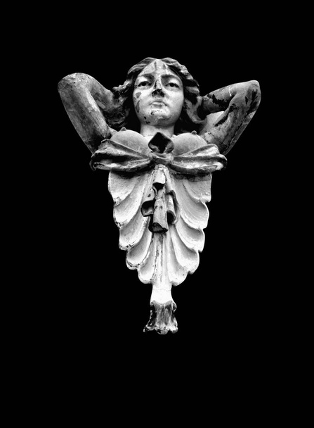 Olympic goddess of love Aphrodite (Venus). Fragment of ancient statue isolated on black background. - Photo, Image