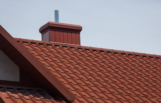 the roof of the house in which modern roofing materials are used - Photo, Image