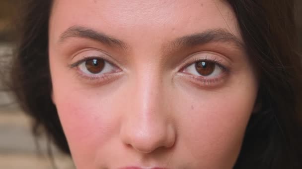 Close up of smiling woman, Girl opening her Beautiful brown eyes. Natural Beauty. Gorgeous woman with long Eyelashes and Attractive Appearance. Slow motion. - Footage, Video