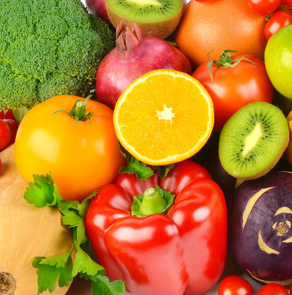 Beautiful bright background from various vegetables and fruits. - Foto, immagini