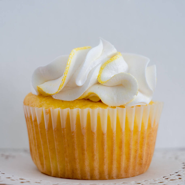 A lemon swirl homemade decorated cupcake. - Foto, afbeelding