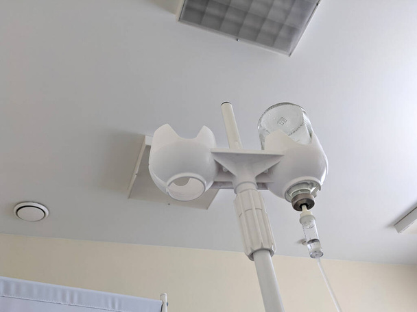 Set fluid intravenous drop saline drip in hospital room. Medical drip or IV drip - Photo, Image