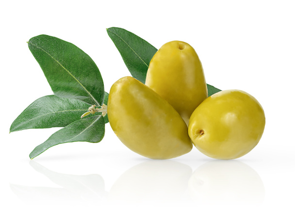 Green olives with green leaves isolated with clipping path. - Photo, Image