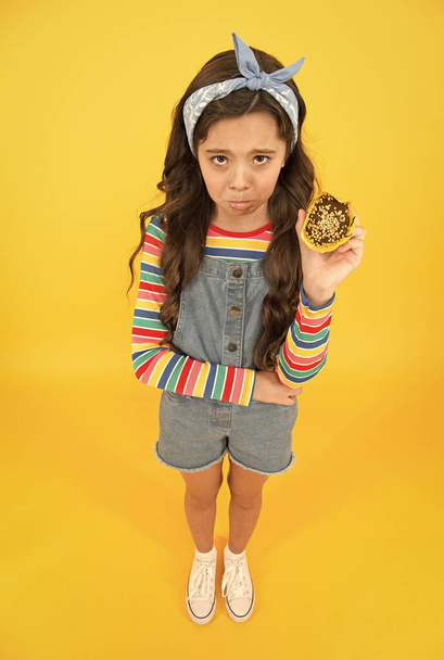 Girl sad face chocolate muffin allergy, sugar levels concept - Photo, image