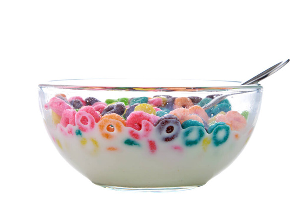 Cereal. Isolate on white. Room for text. a clear glass bowl of cereal and milk. Cereal bowl. time for breakfast. eat your breakfast. oh boy its breakfast time. time to eat.  - Photo, Image
