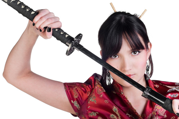 Beauty asian girl with katana isolated on white background - Foto, imagen