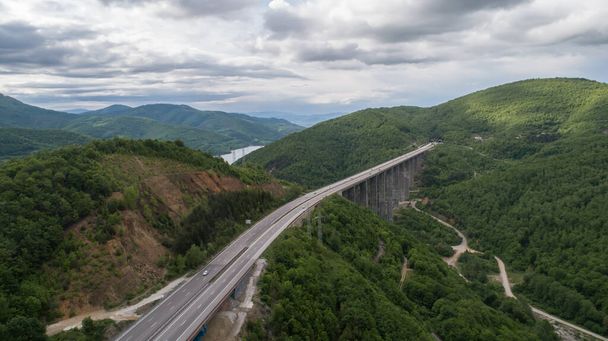 Aerial view of highway and beautiful natural landscape. Mountain bridge.  - Photo, Image