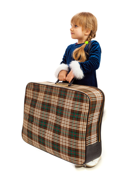 Petite fille avec une grosse valise
 - Photo, image