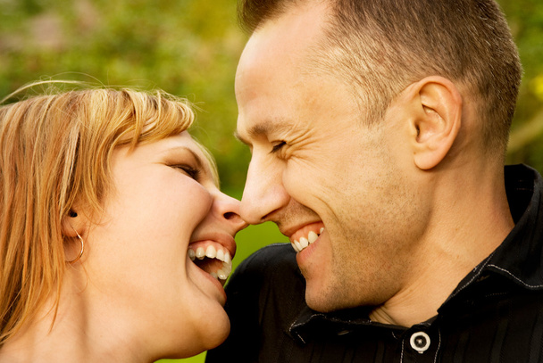 Couple in love outdoors. Close-up portrait. - Photo, Image
