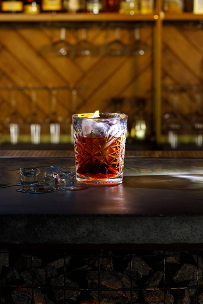 Alcohol bar, cocktail glass on bar counter, cocktail glass in a bar - Φωτογραφία, εικόνα