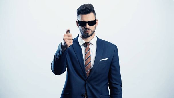 confident businessman with pen and dark sunglasses isolated on white - Φωτογραφία, εικόνα