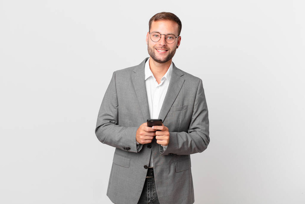 handsome businessman using his smart phone - Foto, afbeelding